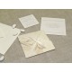 Partecipazione origami con carta foglia caucciù, nastrini di organza e raso. Interno di carta seta.