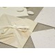 Participation origami paper leaf rubber, organza and satin ribbons. Interior silk paper.