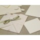 Participation origami paper leaf rubber, organza and satin ribbons. Interior silk paper.