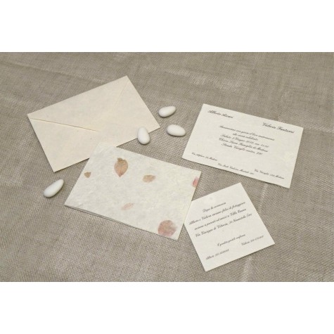 Wedding card in high quality paper with rice and red petals