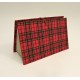 Document holder with compartments lined with tartan fabric closure leather lace and red frogging closed.