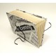 Documents compartments covered in fabric printed newspaper with closure leather lace