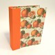 Cookbook made with paper prints with oranges and orange canvas back