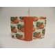 Ricettario da cucina con dorso in tela canapetta arancio e copertina rivestita di carta con stampa "zucche"