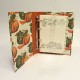 Cookbook made with paper prints with pumpkins and orange canvas back